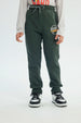 Pantalón Buzo Niño Pitillo Verde Oscuro