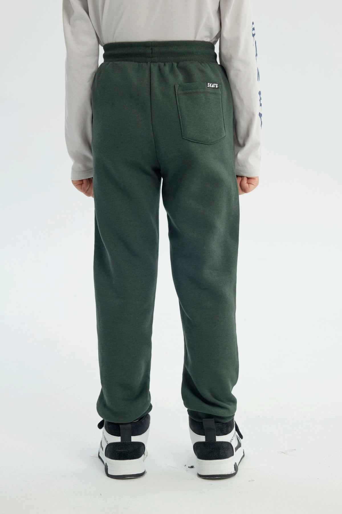 Pantalón Buzo Niño Pitillo Verde Oscuro