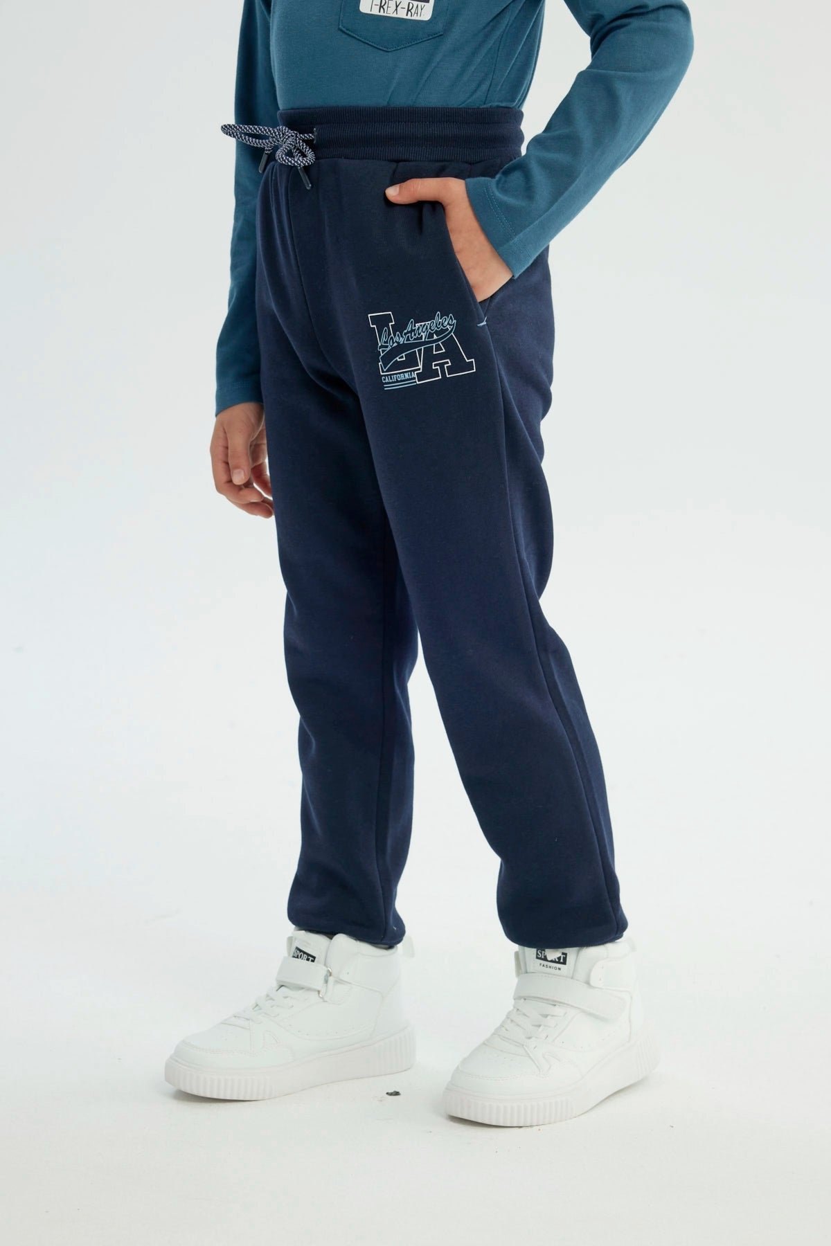 Pantalón Buzo Niño Pitillo Azul Marino