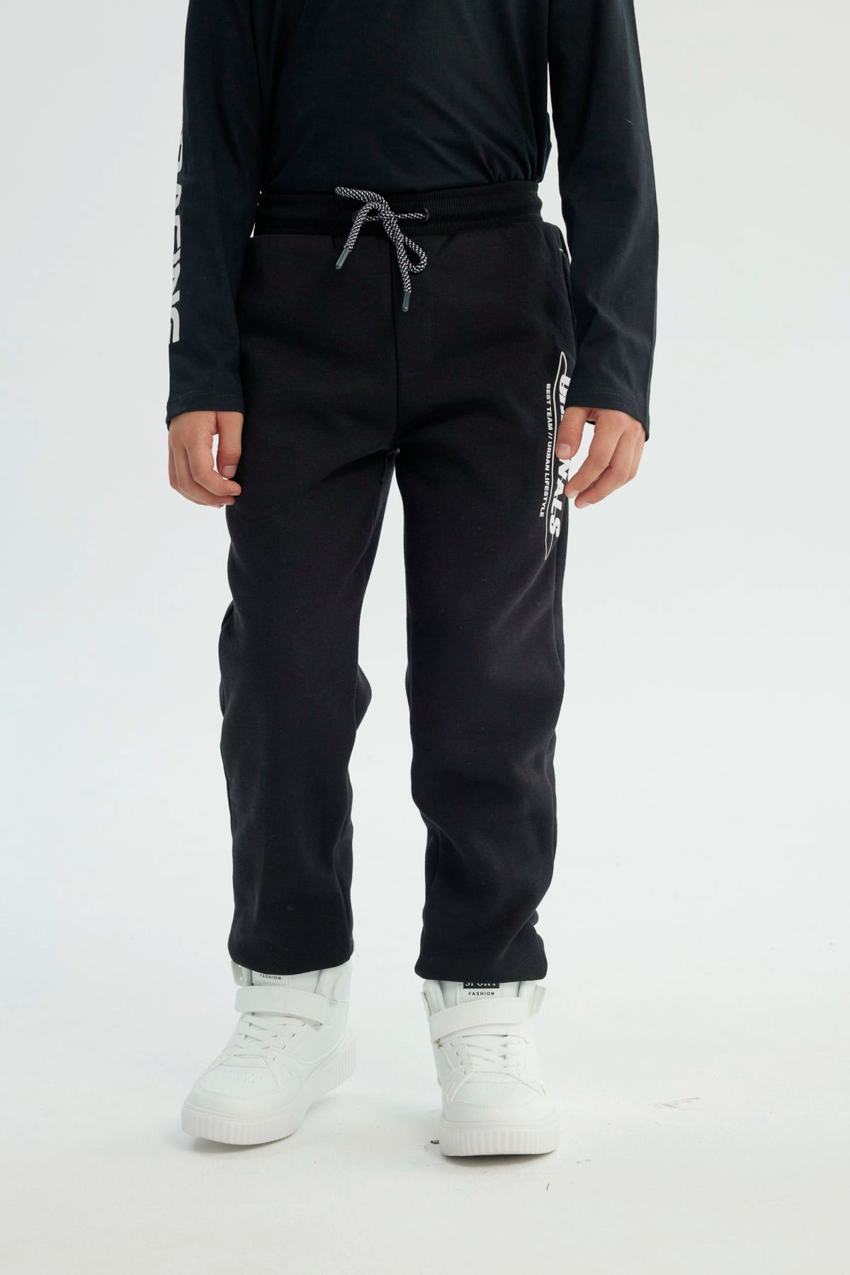 Pantalón Buzo Niño Pitillo Negro