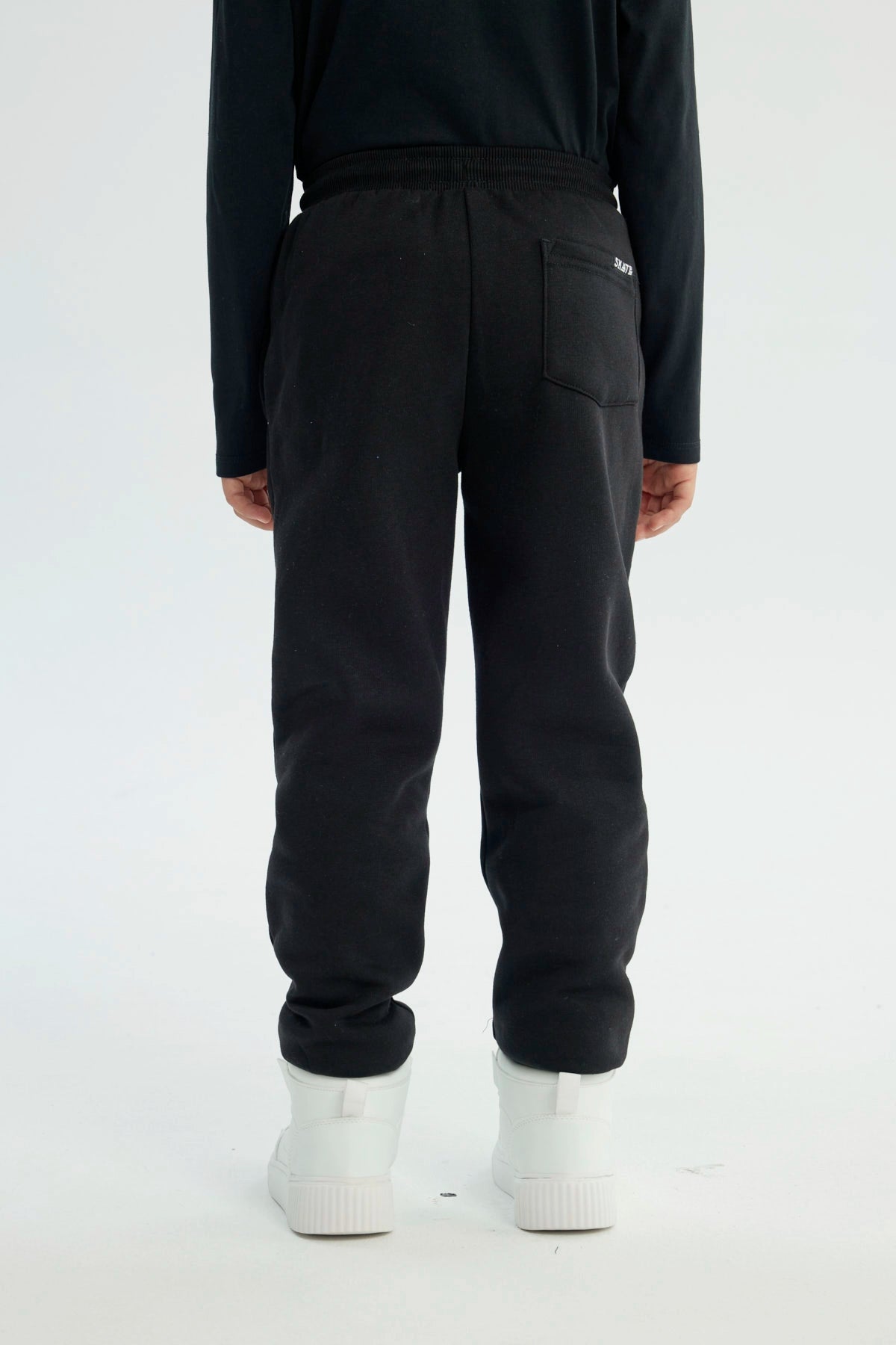 Pantalón Buzo Niño Pitillo Negro