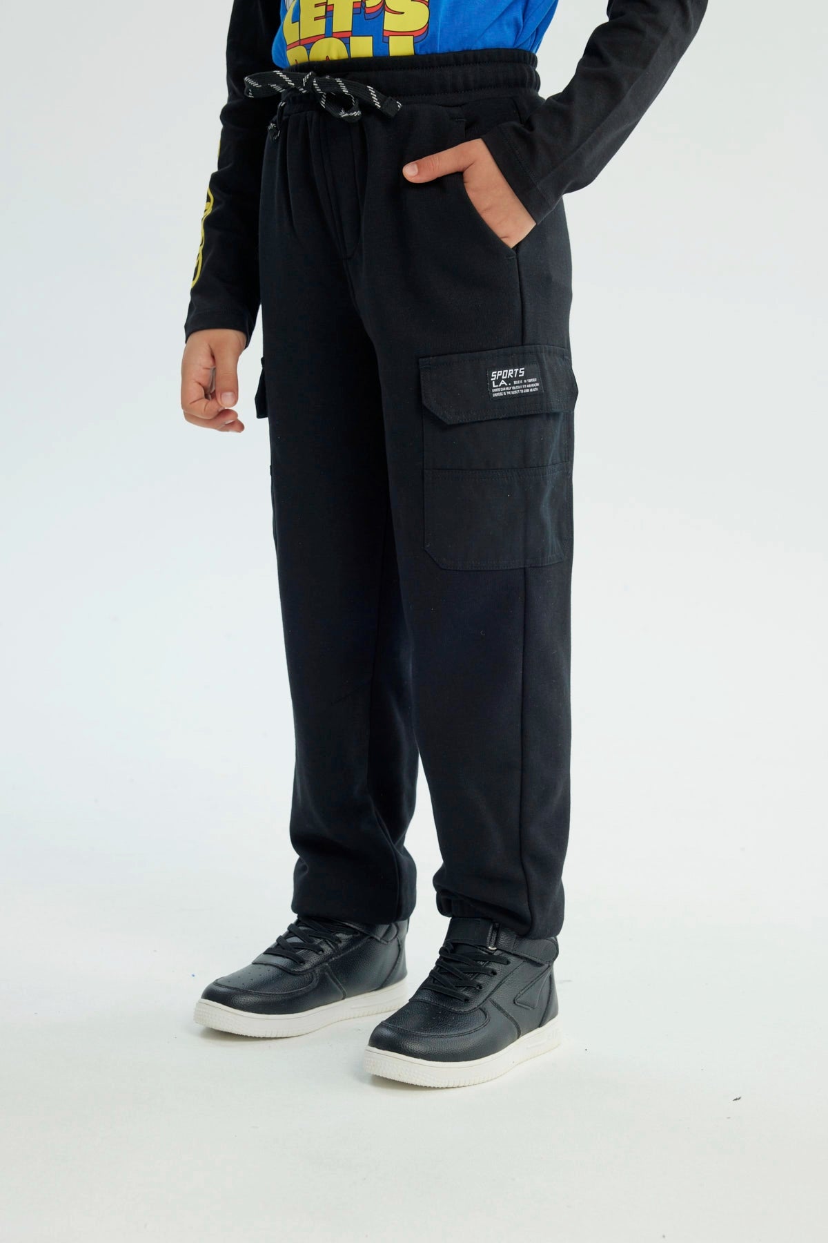 Pantalón Buzo Niño Pitillo Negro