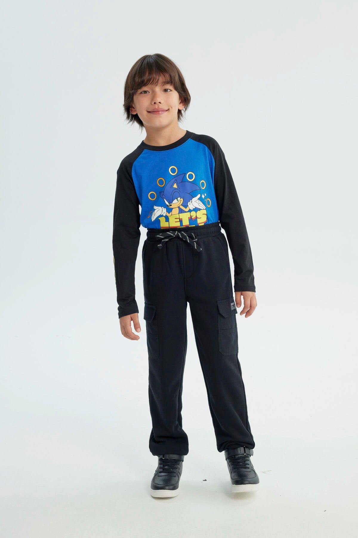 Pantalón Buzo Niño Pitillo Negro