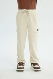 Pantalón Buzo Niño Pitillo Beige