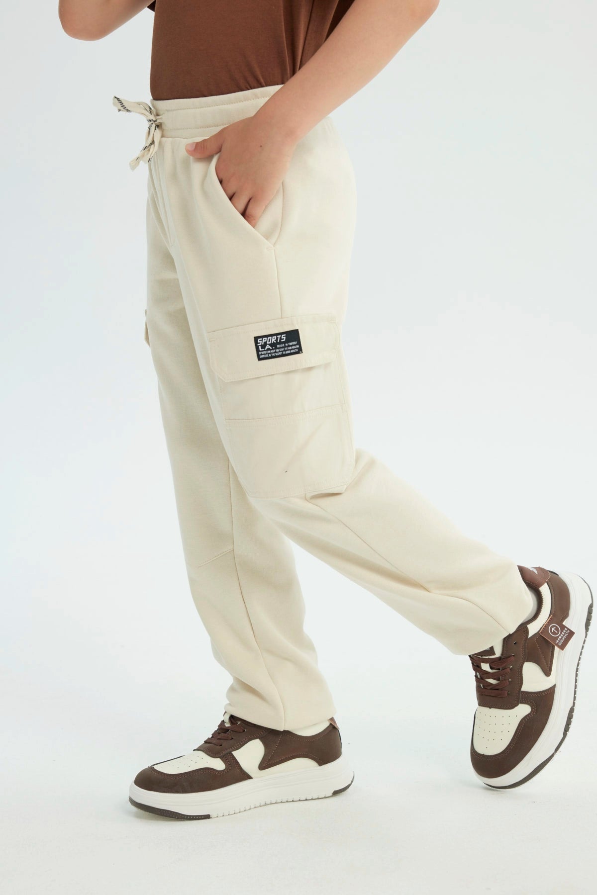 Pantalón Buzo Niño Pitillo Beige