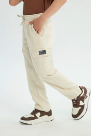 Pantalón Buzo Niño Pitillo Beige