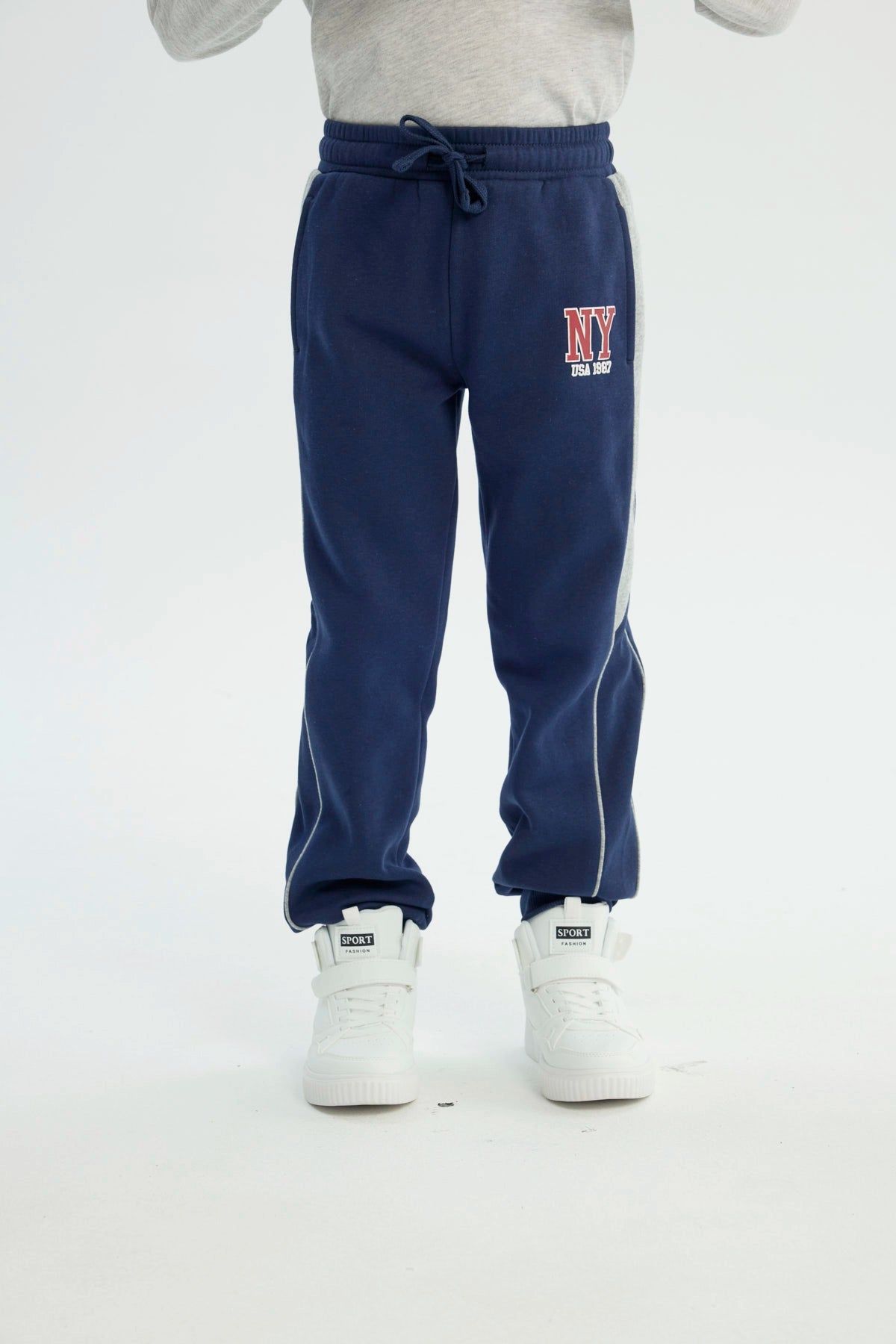 Pantalón Buzo Niño Pitillo Azul Oscuro