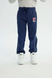 Pantalón Buzo Niño Pitillo Azul Oscuro
