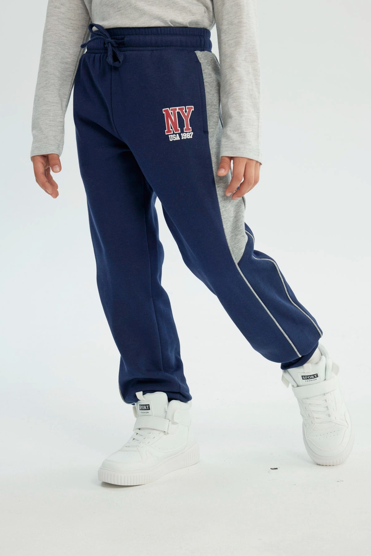 Pantalón Buzo Niño Pitillo Azul Oscuro