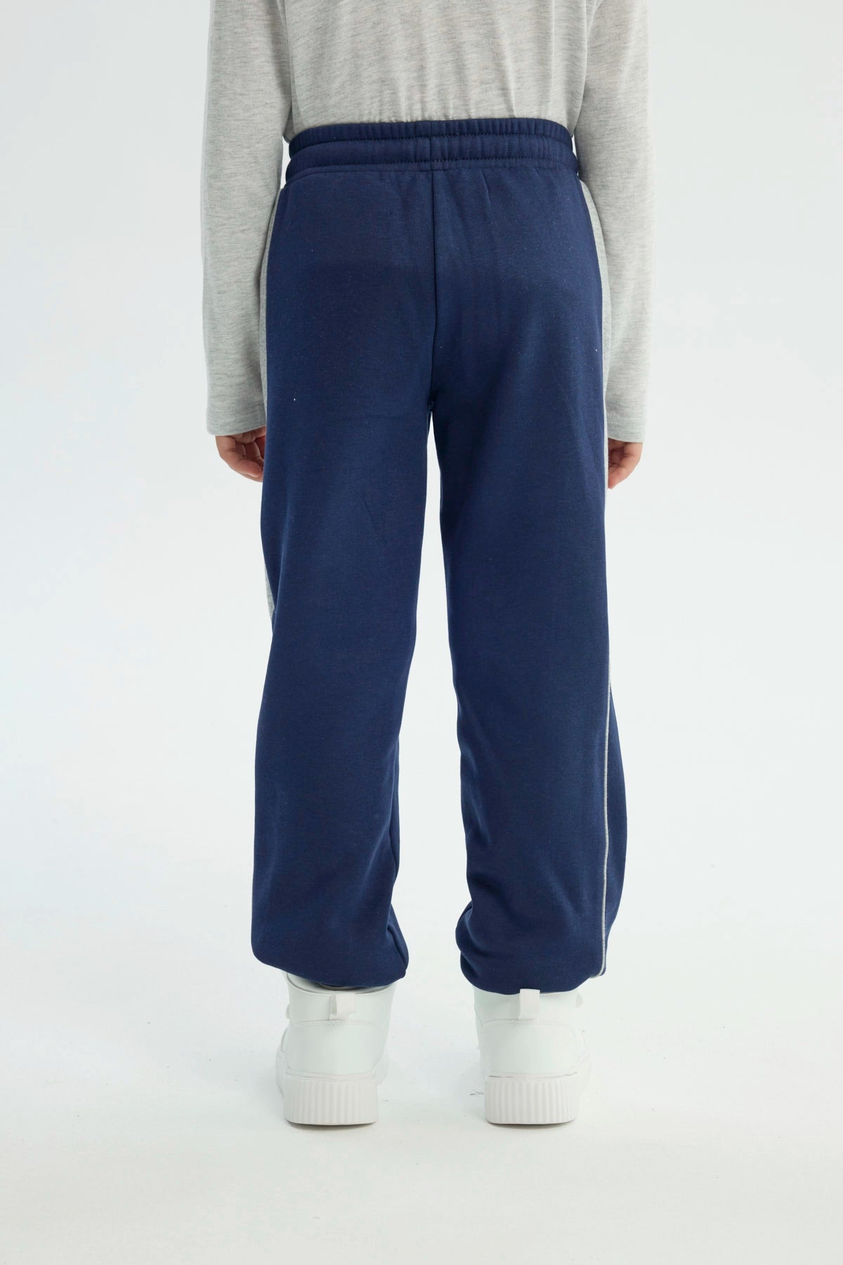 Pantalón Buzo Niño Pitillo Azul Oscuro