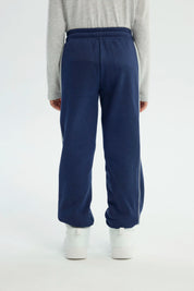 Pantalón Buzo Niño Pitillo Azul Oscuro