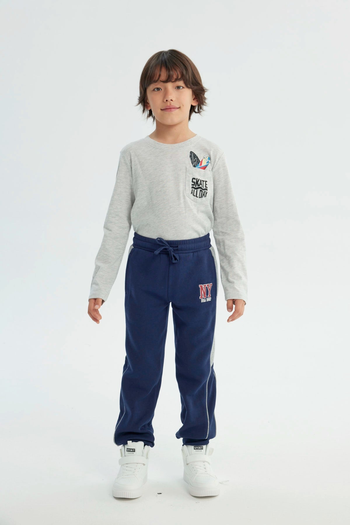 Pantalón Buzo Niño Pitillo Azul Oscuro
