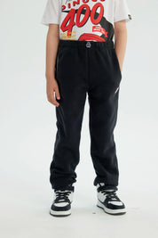 Pantalón Buzo Niño Pitillo Negro