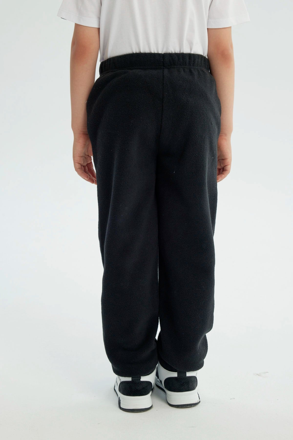 Pantalón Buzo Niño Pitillo Negro