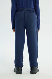 Pantalón Buzo Niño Pitillo Azul Oscuro