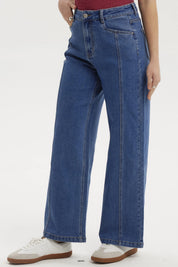 Jeans mujer wide leg azul oscuro con diseño liso costuras visibles estilo casual y corte amplio