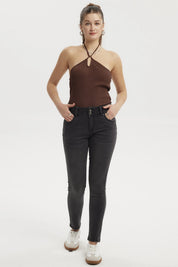 Jeans mujer skinny negro ajustados con dos botones delanteros y cinco bolsillos sin estampa lisa