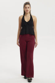 Polera mujer negra tipo halter con lazo en el pecho diseño liso sin estampado ajuste elegante y cómodo