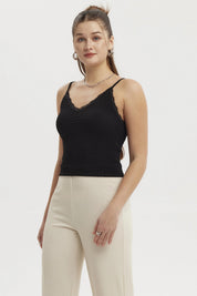 Peto negro mujer con textura y encaje en escote sin estampa lisa elegante