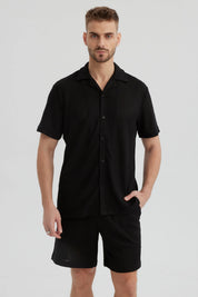Camisa negra de hombre con cuello camisero slim de poliéster y diseño texturizado lisa