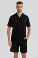 Camisa negra de hombre con cuello camisero slim de poliéster y diseño texturizado lisa