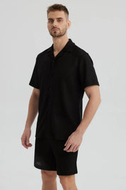 Camisa negra de hombre con cuello camisero slim de poliéster y diseño texturizado lisa