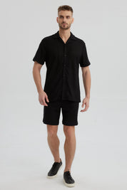 Camisa negra de hombre con cuello camisero slim de poliéster y diseño texturizado lisa