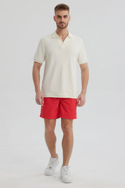 Polera hombre beige lisa con textura cuello polo manga corta ajuste relajado