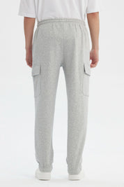 Pantalón Buzo Hombre Juvenil Pitillo Gris Melange