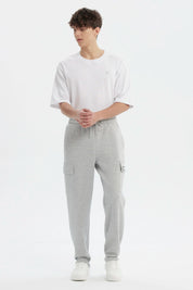 Pantalón Buzo Hombre Juvenil Pitillo Gris Melange