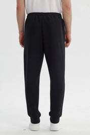 Pantalón Buzo Hombre Juvenil Pitillo Negro
