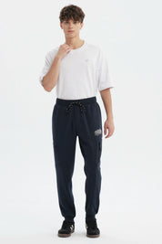 Pantalón Buzo Hombre Pitillo Marengo