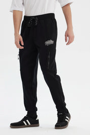 Pantalón Buzo Hombre Pitillo Negro
