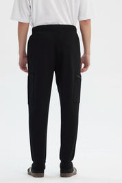 Pantalón Buzo Hombre Pitillo Negro