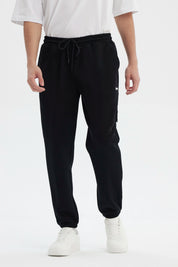 Pantalón Buzo Hombre Pitillo Negro
