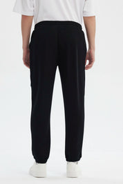 Pantalón Buzo Hombre Pitillo Negro
