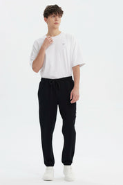 Pantalón Buzo Hombre Pitillo Negro