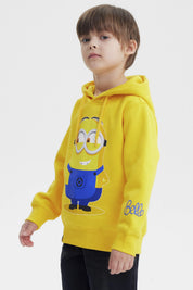 Polerón amarillo para niño con capucha diseño de Minion al frente en estilo animado ocupando el centro a gran tamaño