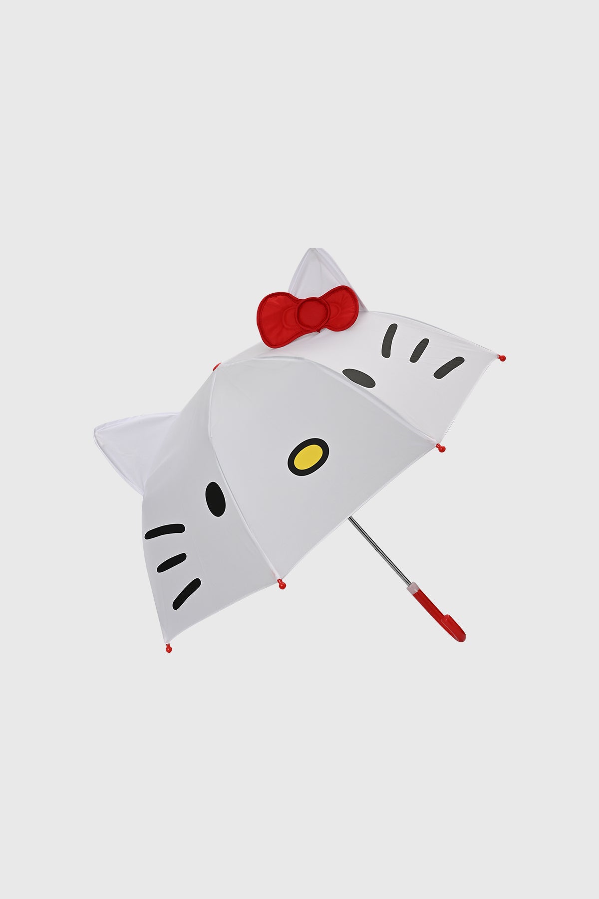 Paraguas blanco con diseño de Hello Kitty en el centro orejas y lazo rojo 3D detalles negros y amarillos