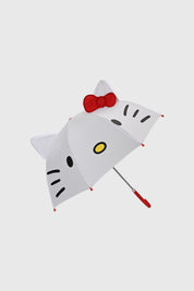 Paraguas blanco con diseño de Hello Kitty en el centro orejas y lazo rojo 3D detalles negros y amarillos