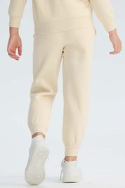 Pantalón Buzo Niña Jogger Minie Beige