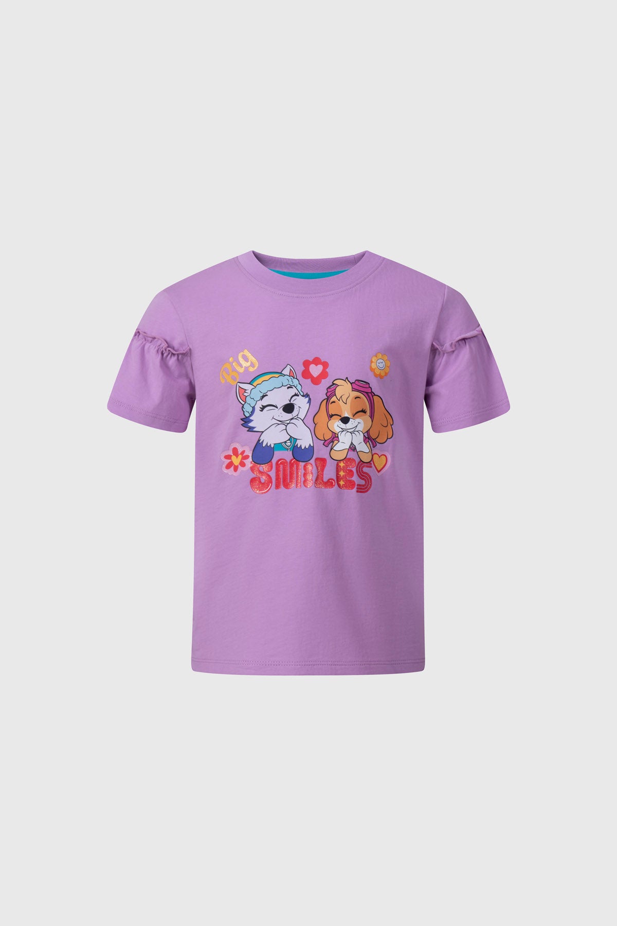 Polera niña Paw Patrol lila con estampado de personajes y detalles de flores y corazones