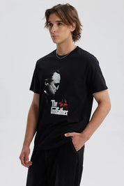 Polera hombre juvenil negro con diseño de El Padrino y logo en blanco y rojo