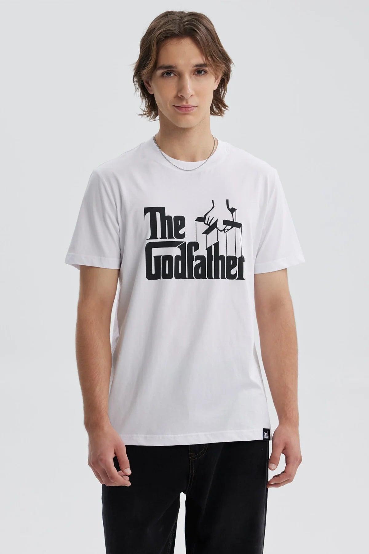 Polera blanca de hombre con estampado The Godfather en el pecho