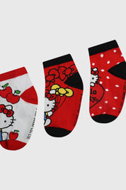 Calceta deportiva niña tripack roja con estampado de Hello Kitty en diferentes escenas gráfico colorido y divertido