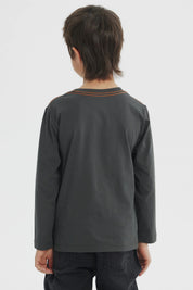 Polera niño gris melange con Goku de Dragon Ball en el frente diseño gráfico colorido y texto Dragon Ball Z debajo