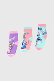 Calcetines para niña en tonos celeste y lila con estampas de Stitch en diferentes escenas gráficas animadas.