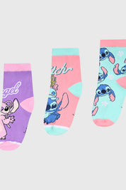 Calcetines para niña en tonos celeste y lila con estampas de Stitch en diferentes escenas gráficas animadas.
