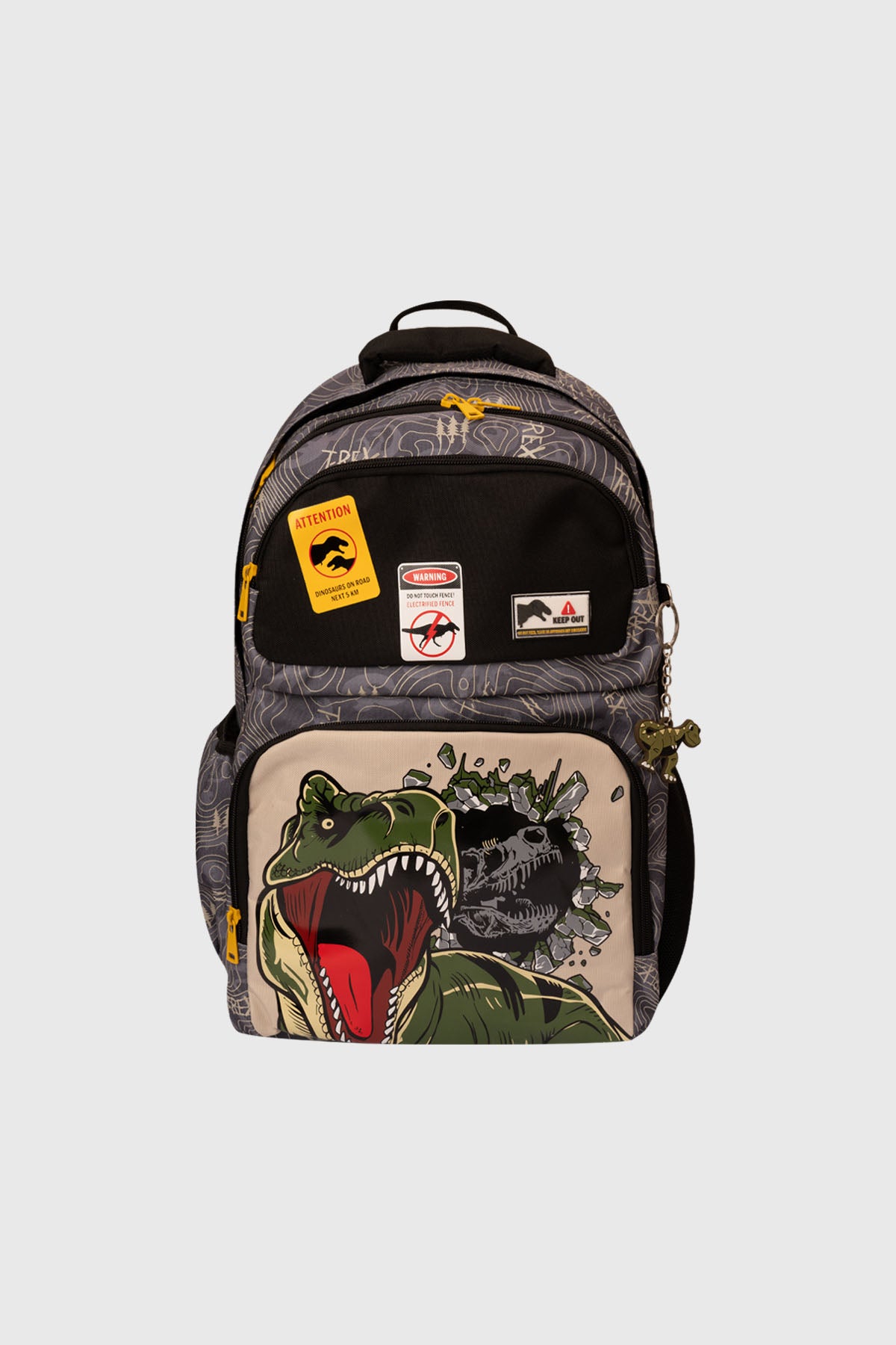 Mochila negra con diseño de dinosaurio T-Rex rompiendo pared en el bolsillo frontal estilo cómic