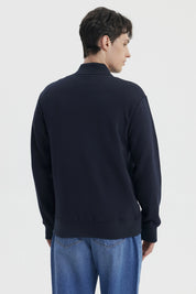 Chaqueta unisex azul marino con botones frontales y bolsillos laterales prenda lisa casual y versátil